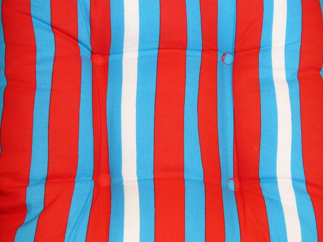 Stock photo: striped fabric cushion on display in shop