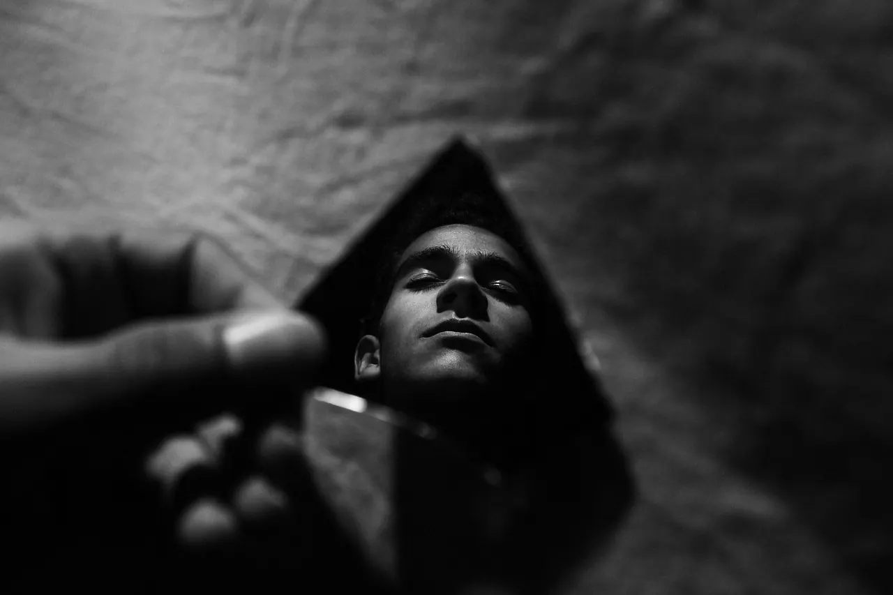 Stock photo: man looking in mirror
