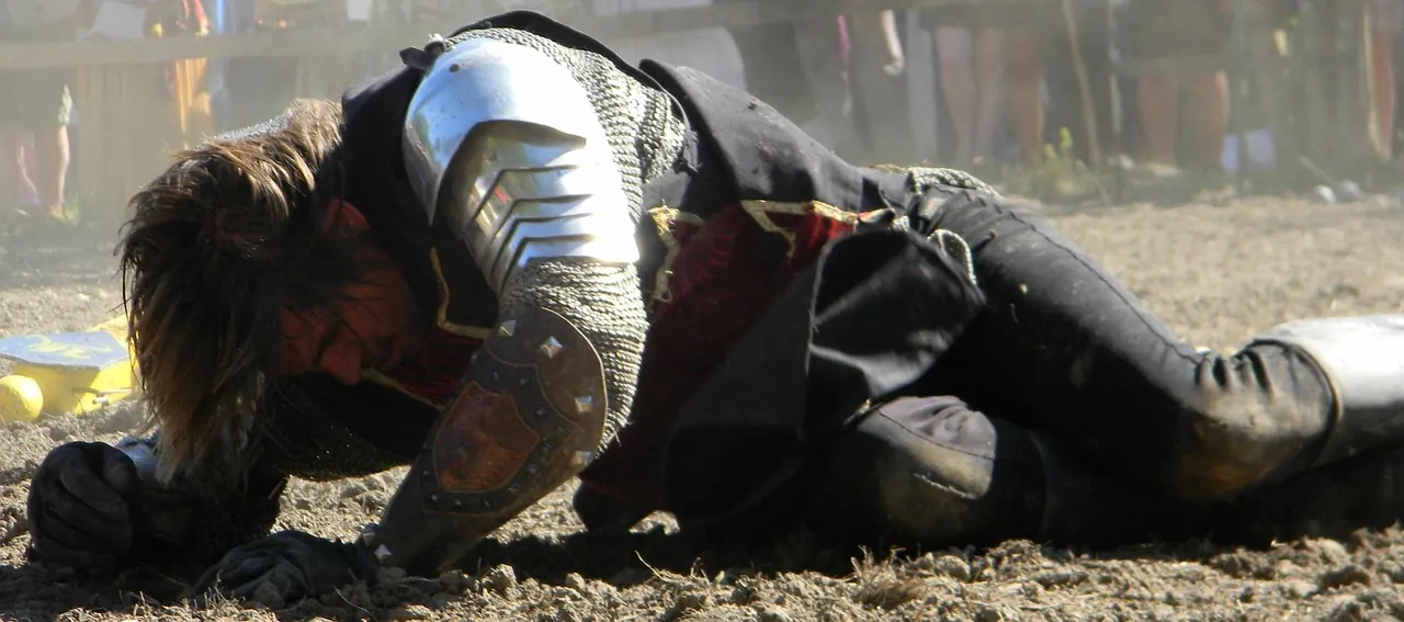 Stock photo: Medieval reenactors fighting with swords outdoors
