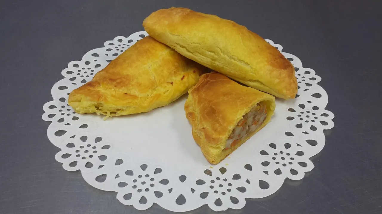 Stock photo: freshly baked pasty on a wooden board