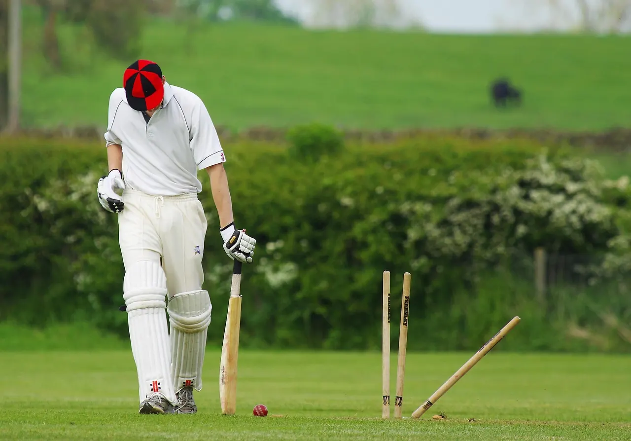 Stock photo: empty cricket pitch covered in rain covers