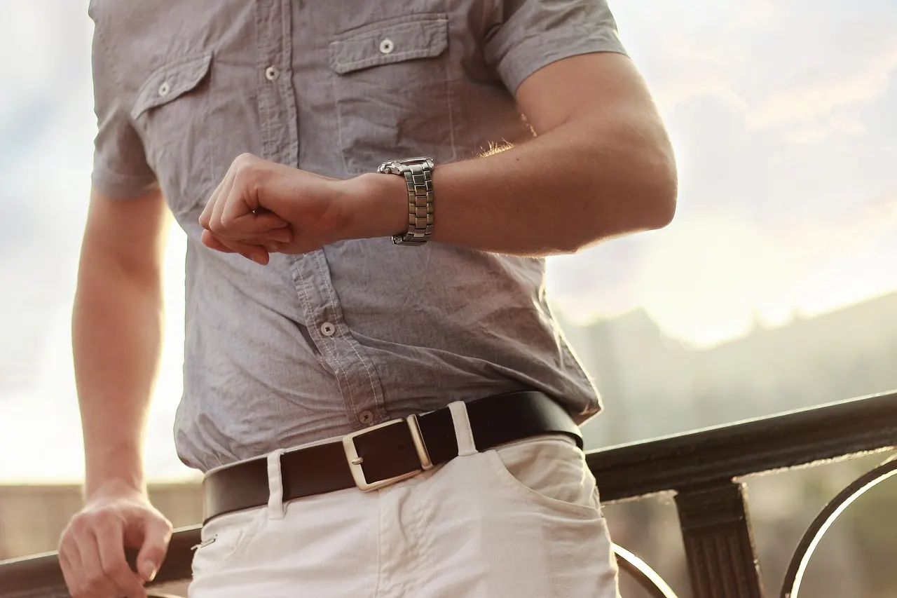 Stock photo: person checking watch