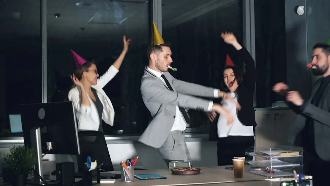 Stock photo: office workers cheering and celebrating a low test score