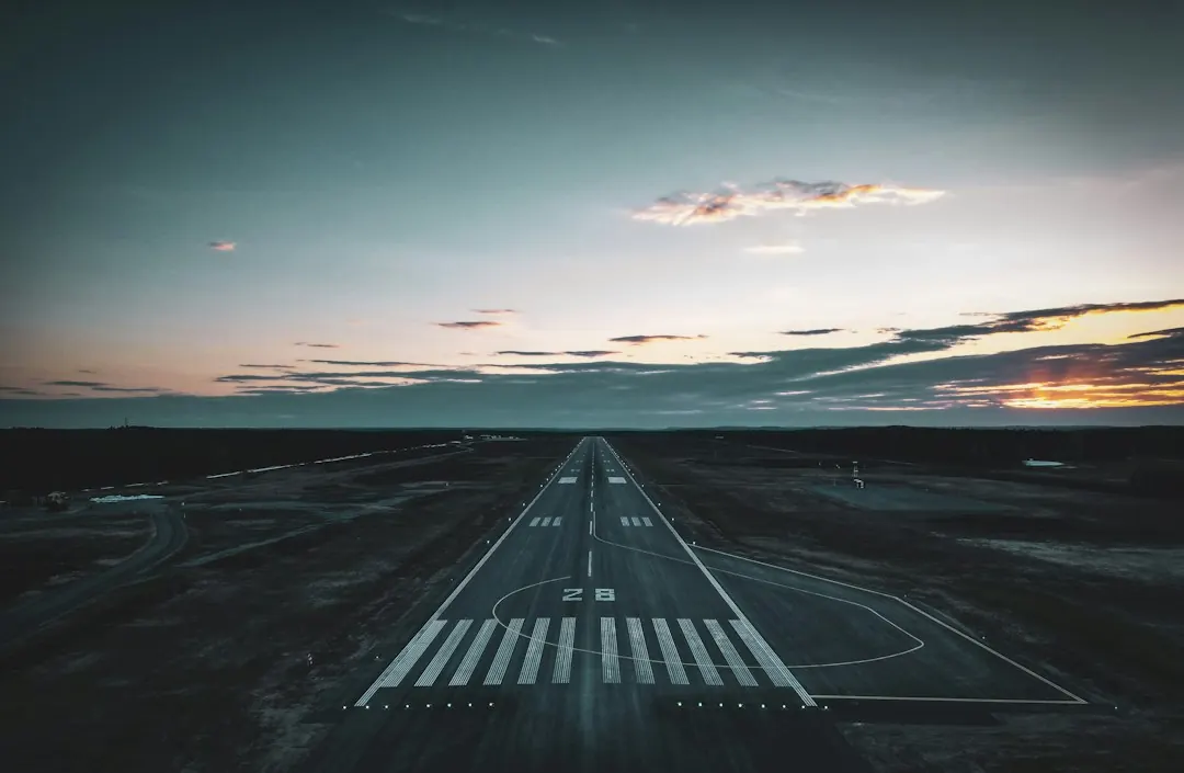 Stock photo: stormy sky over an airport runway