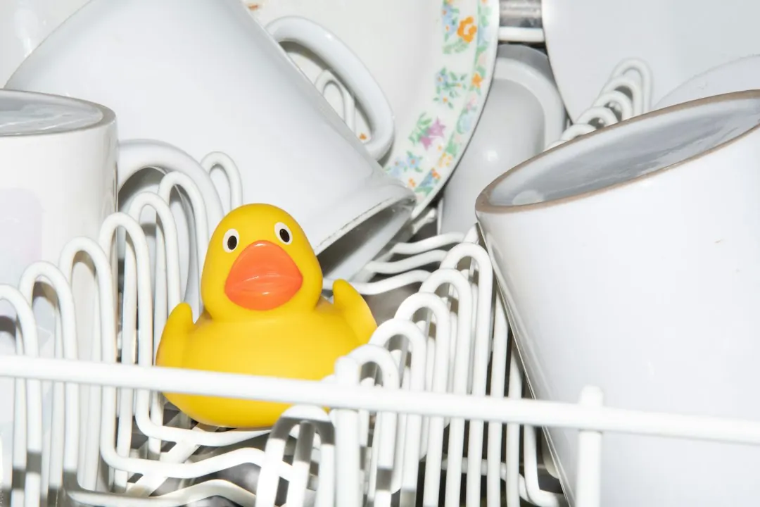 Stock photo: an open dishwasher