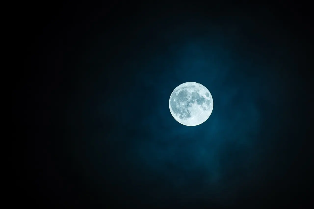 Stock photo: glowing full moon shining in night sky