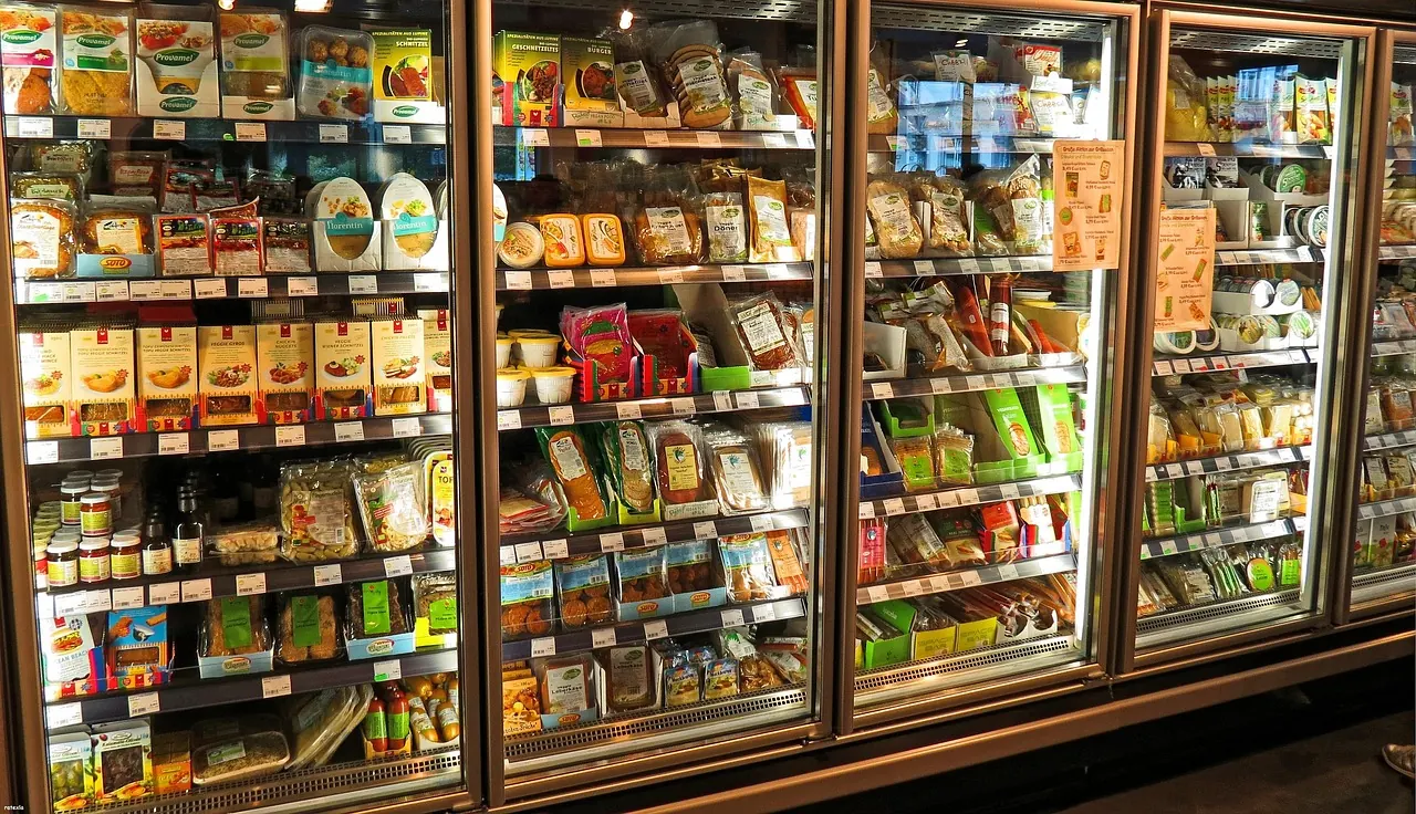 Stock photo: supermarket freezer aisle with open glass doors