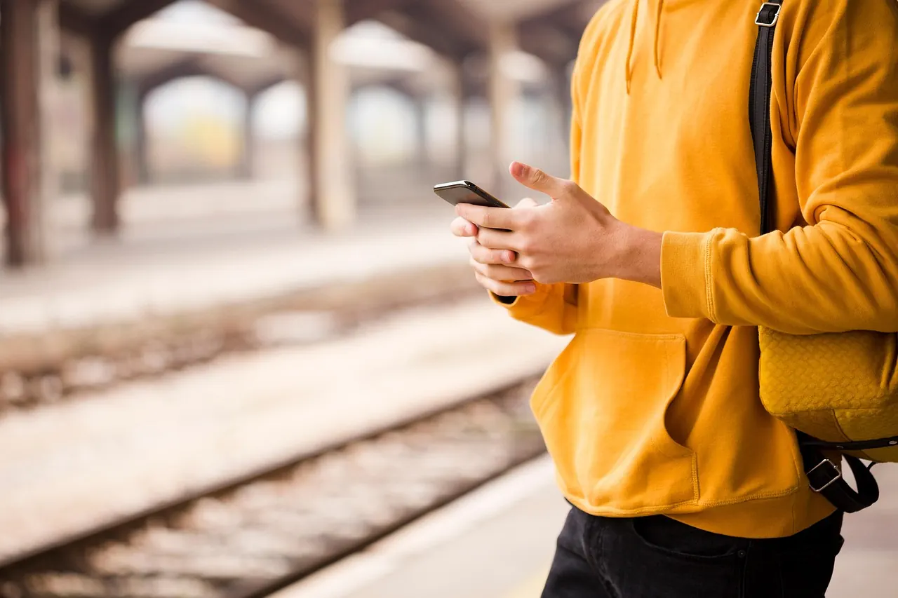 Stock photo: passengers waiting on a train station platform