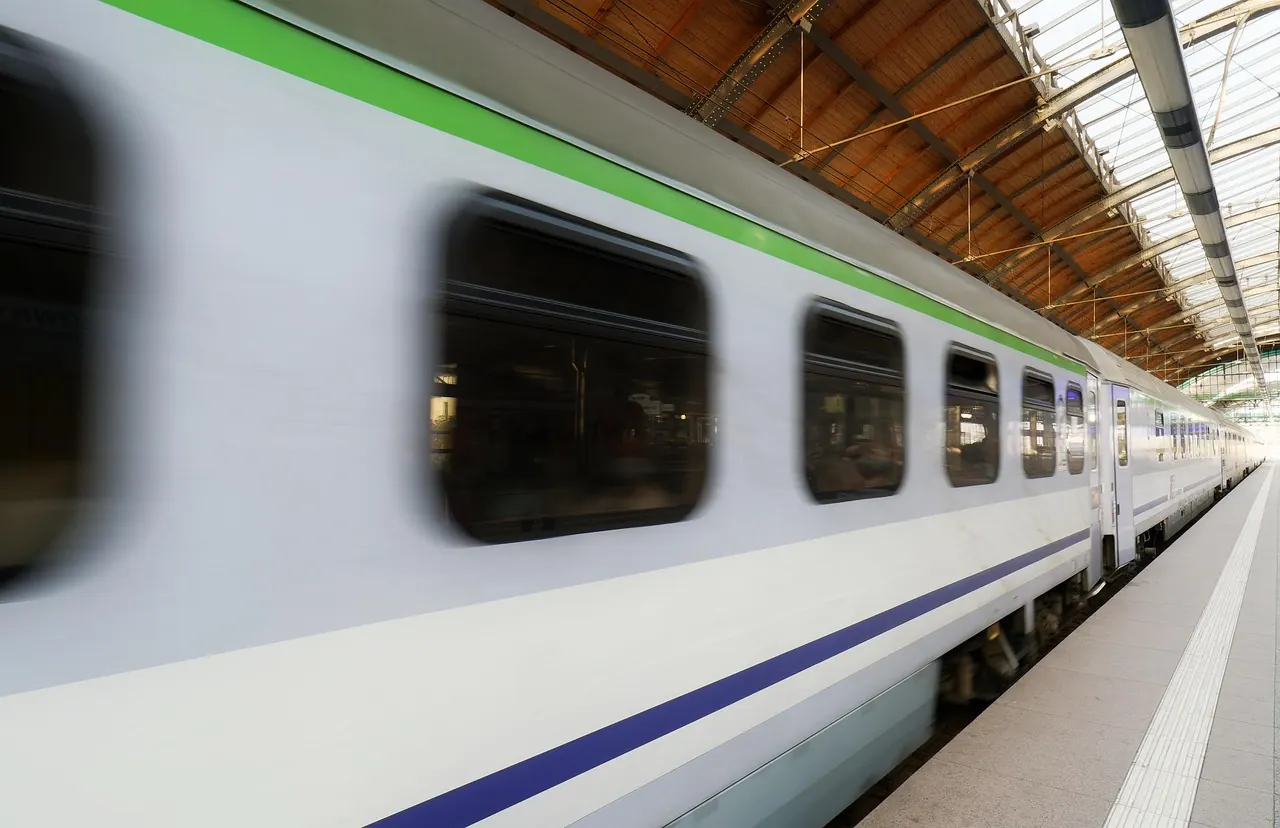 Stock photo: passengers waiting beside delayed train on platform