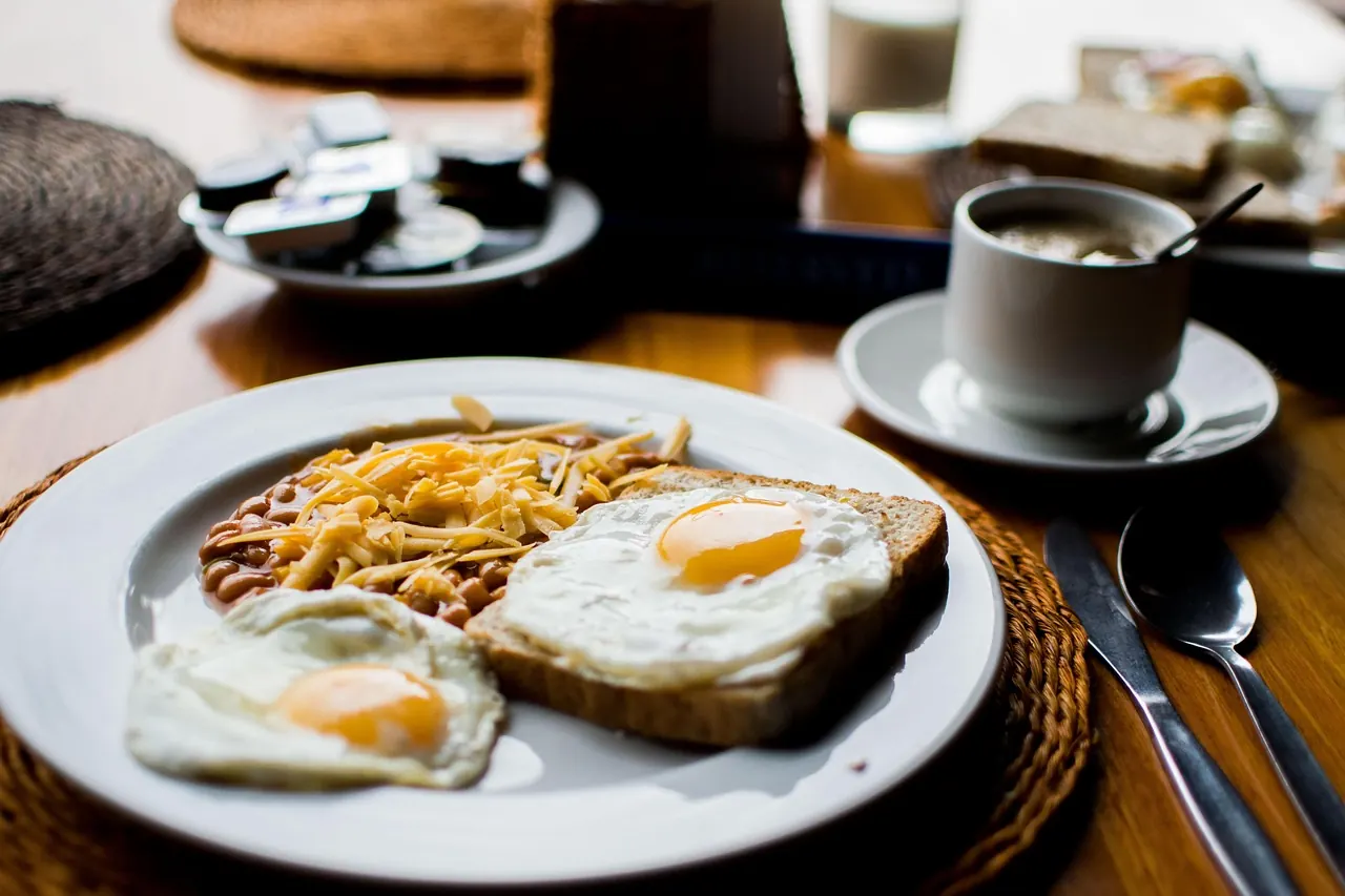 Stock photo: sculpted breakfast food on a table