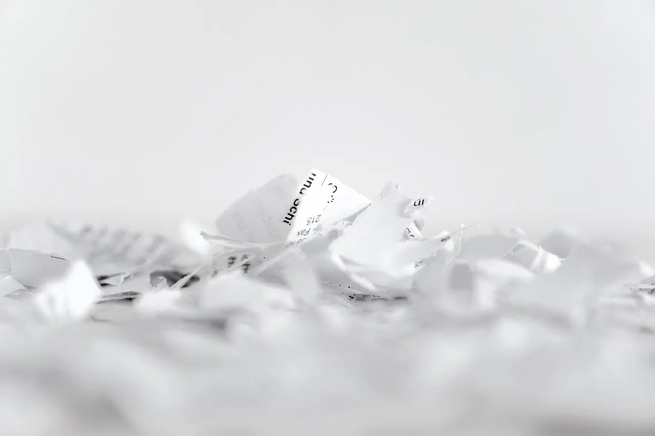Stock photo: hands stapling extra pages to document