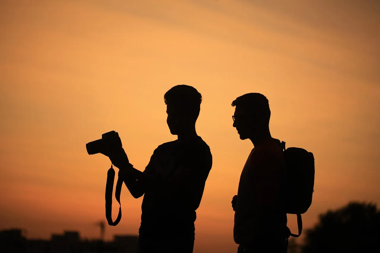 Stock photo: tourists taking photos of scenic landscape